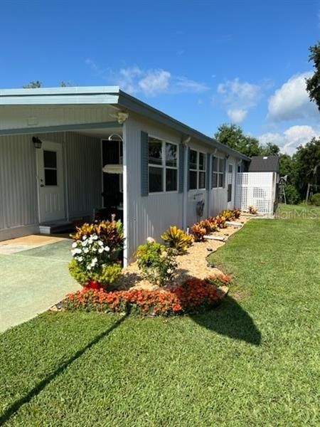 View of side with new landscaping