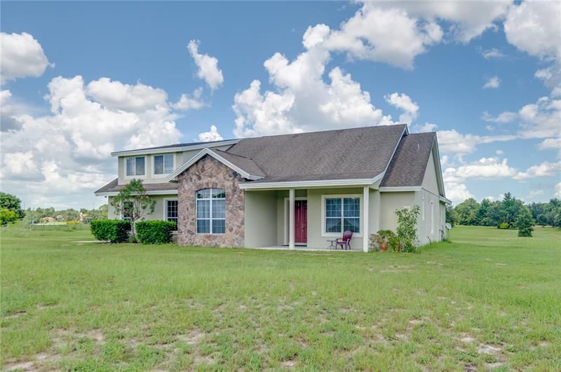 2 STORY  CONCRETE BLOCK HOME built in 2004 ON 10.10 ACRES