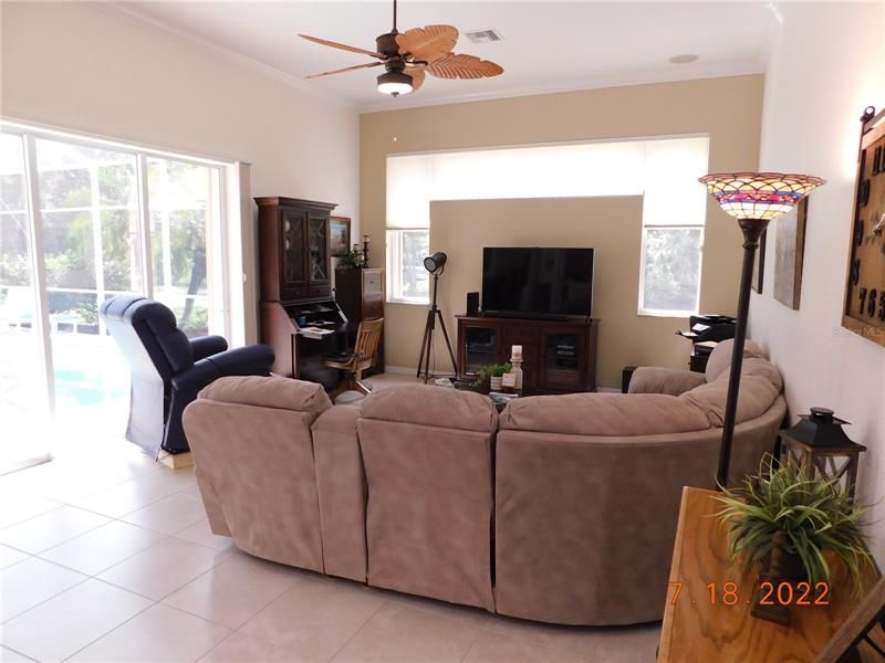 Family room opens to the lanai & pool