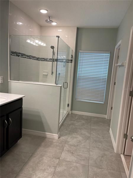 Walk-in shower with programable temperature control.