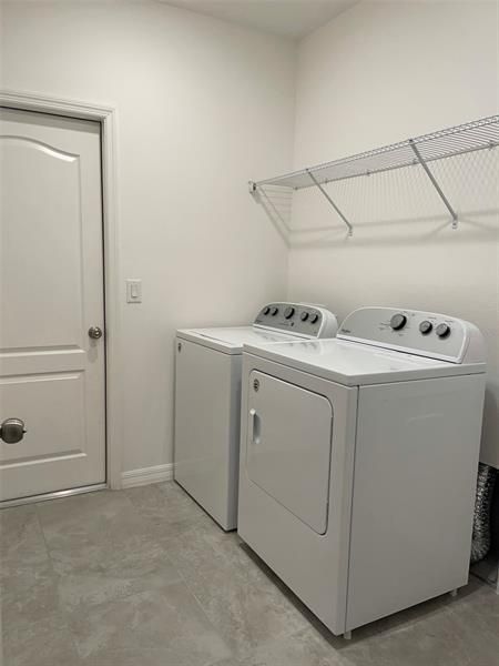 Washer and dryer included.