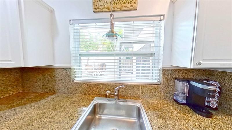 Sink Overlooking Pool Area