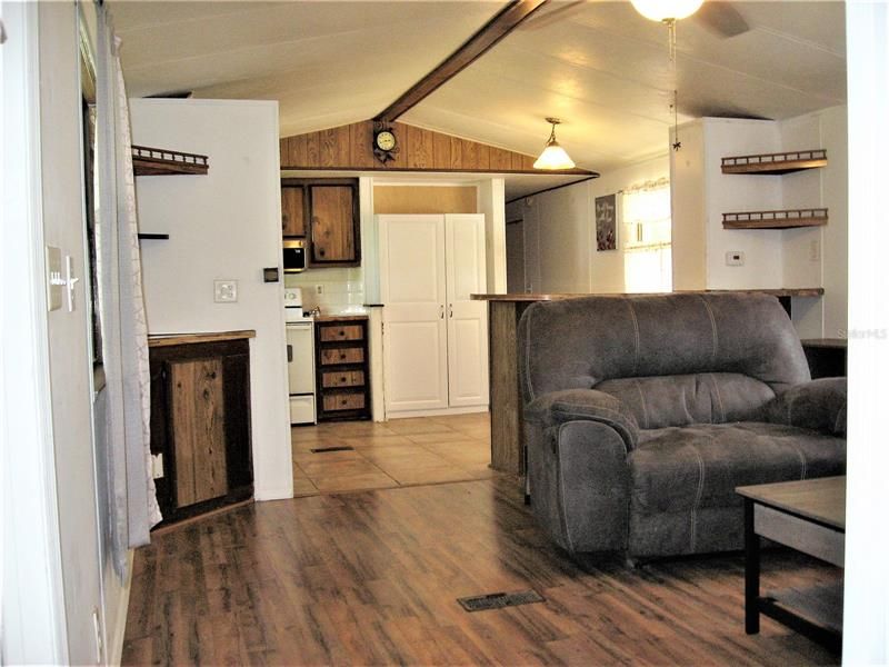 LIVING ROOM INTO KITCHEN