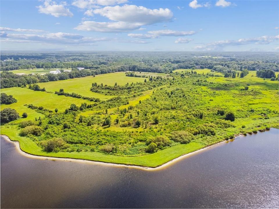 100 Acre Meadow View with Lake Hendry Views