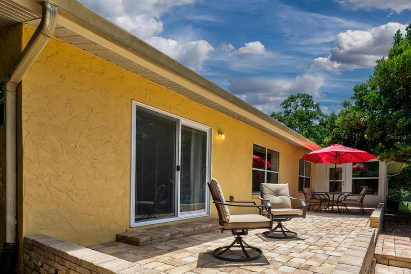 Back of home and patio off master bedroom