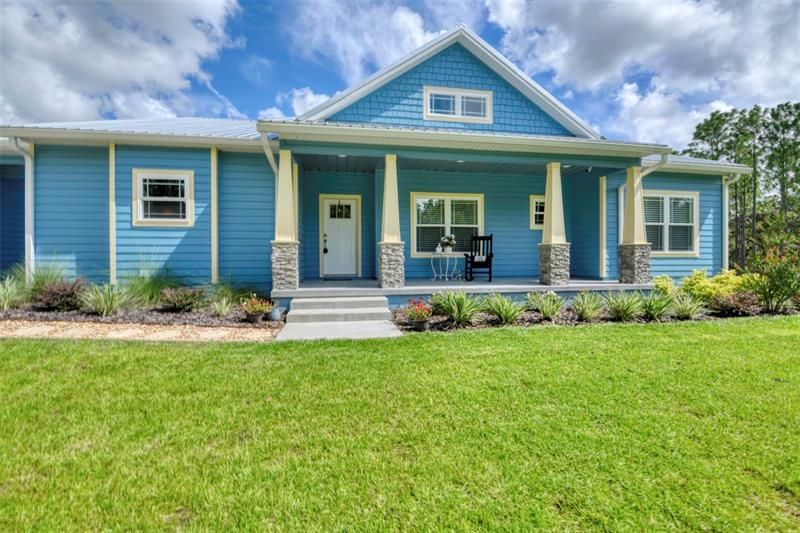 STACKED STONE COLUMNS/FRONT PORCH