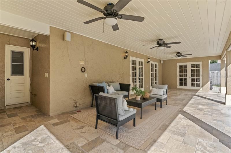 Travertine covered Lanai with hookups for an outdoor kitchen!