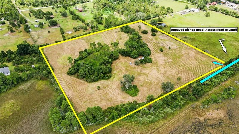 Teal Arrow shows how you Access your Land off Unpaved Bishop Road! Center of Property you can see Chicken Coop- BYOC (Bring your Own Chickens)!