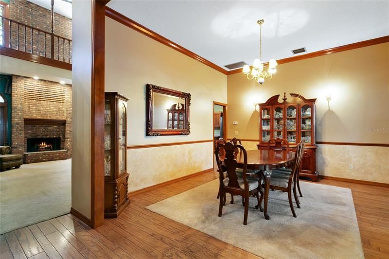 Formal dining room with crown molding