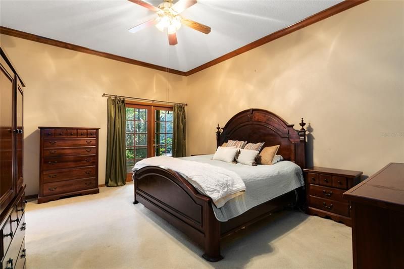 Master bedroom with french doors to lanai