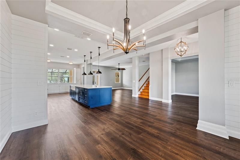 Large Dining room with Custom lighting and Shiplap