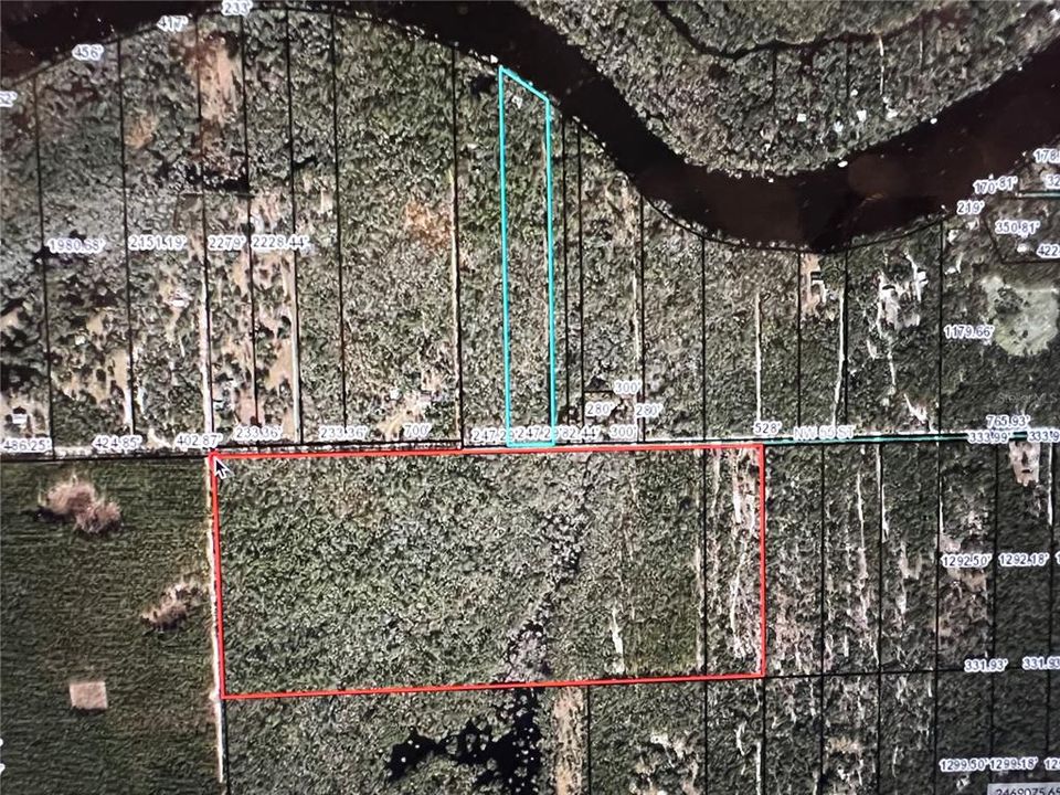 Red area is the 80 acres and the blue area is the other 10.73 with a house on the river for sale by the same owners.