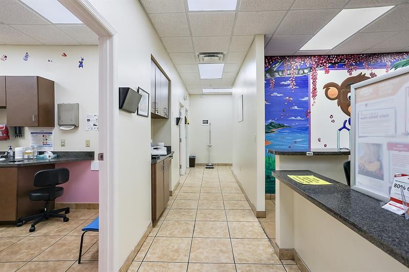 Hallway facing west Exam room #1 on left