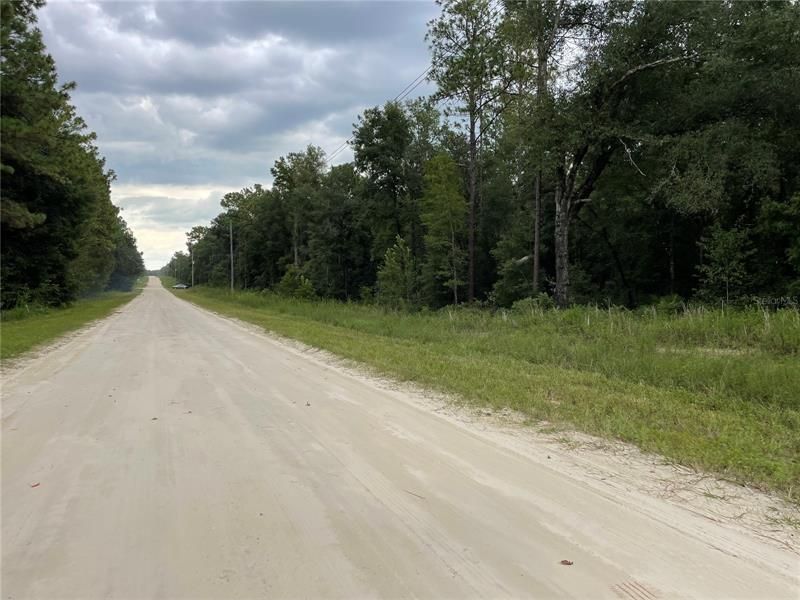 County Maintained Limerock Road to the North.  Close to paved road in to the South