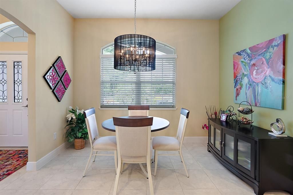 Eat in area of kitchen with upgraded light fixture