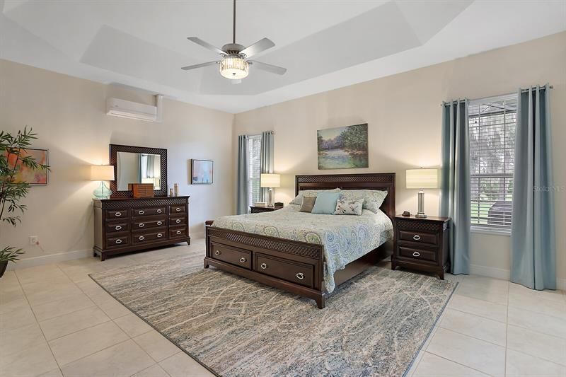 Master bedroom w/Tray ceiling & tile floor