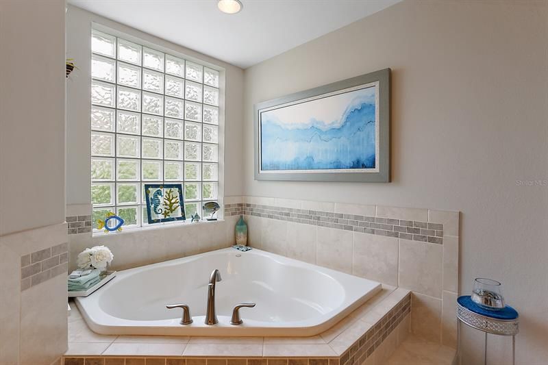 En suite with large soaking tub