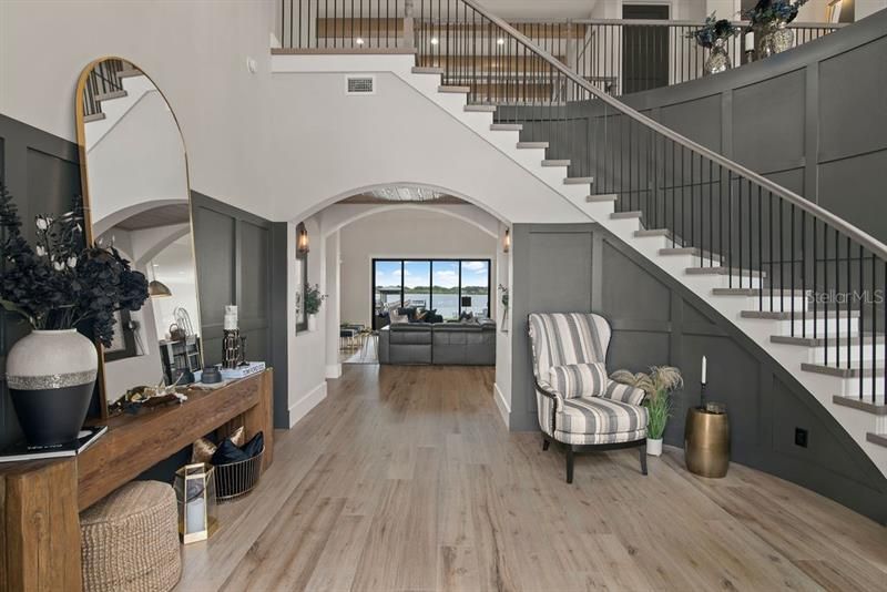 Custom millwork, custom staircase and imported Italian white oak tile flooring