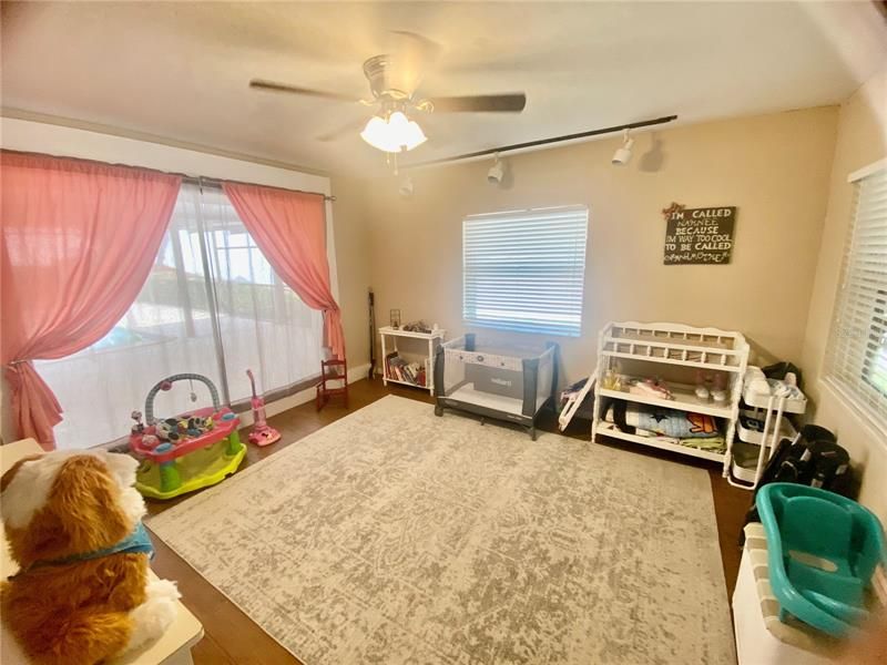 2nd Bedroom with sliding doors to screened lanai