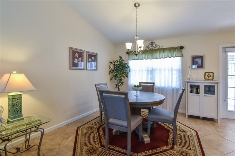 Dining Room with Vaulted Ceiling