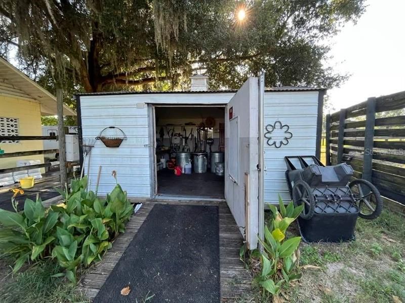 Storage shed with toilet inside