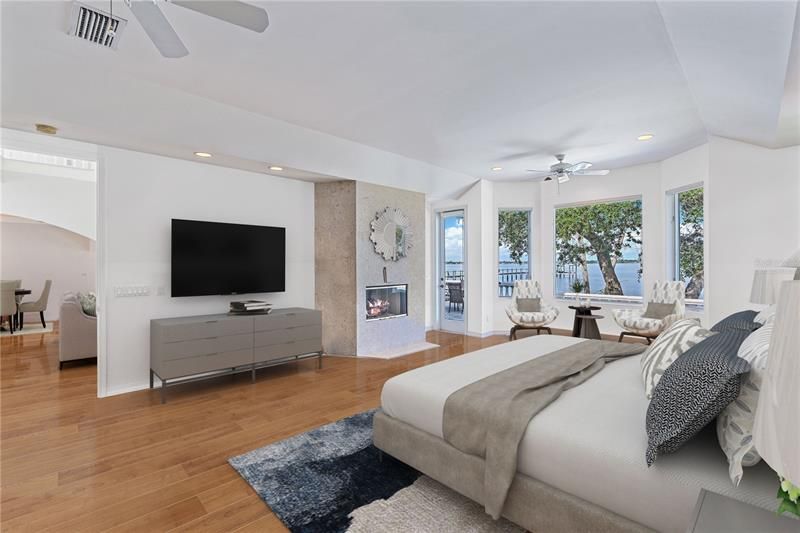 First Floor Master/Owners Suite adjacent to Great Room, the Sunset Terrace and fabulous wide water views of the Intracoastal. Room is Virtually Staged.