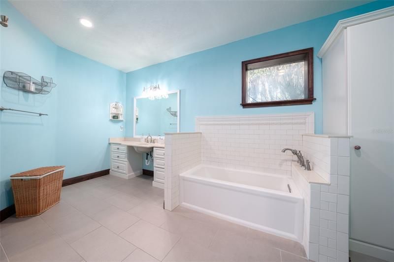 Bath #3 has been completely renovated and enlarged. Linen closet to the right of tub.