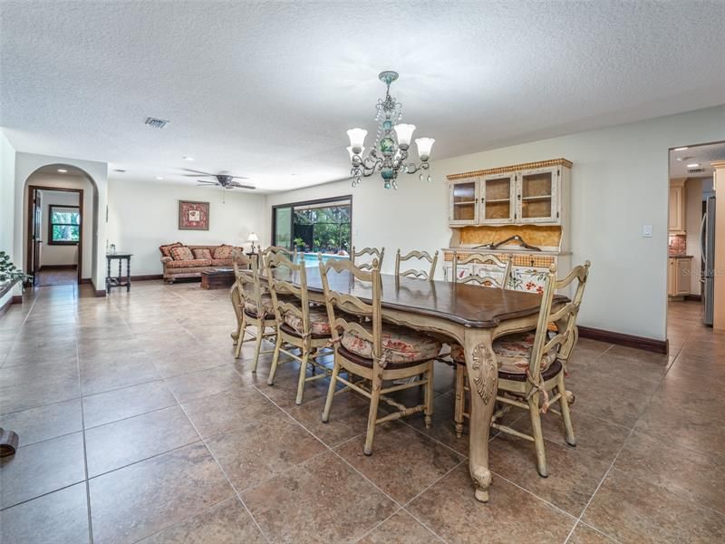 Spacious living and dining room. A dining room wall was removed to create an open floor plan.