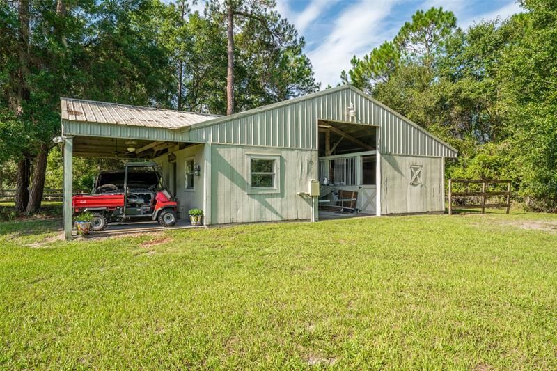 Two stables, tack and feed room.