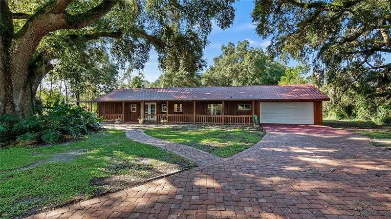 Front of 400 Youth Camp Road from the large brick paver circular driveway