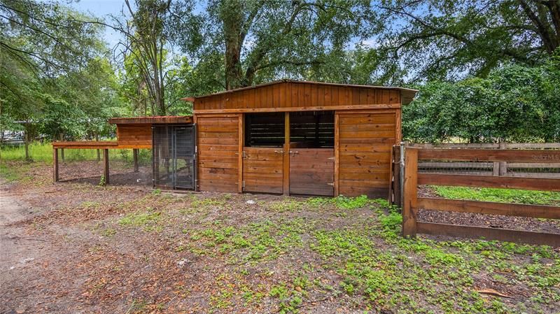 Critter house and fenced in area