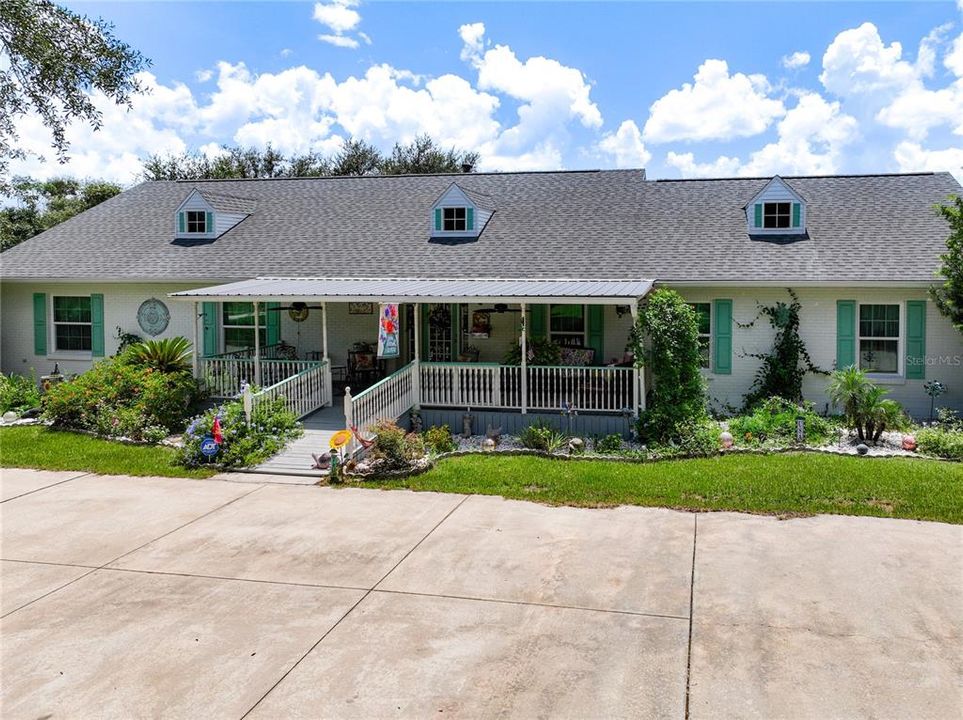 Custom built pool home with 3720 square feet of living area, 4 BR / 3 BA on 5+ acres.