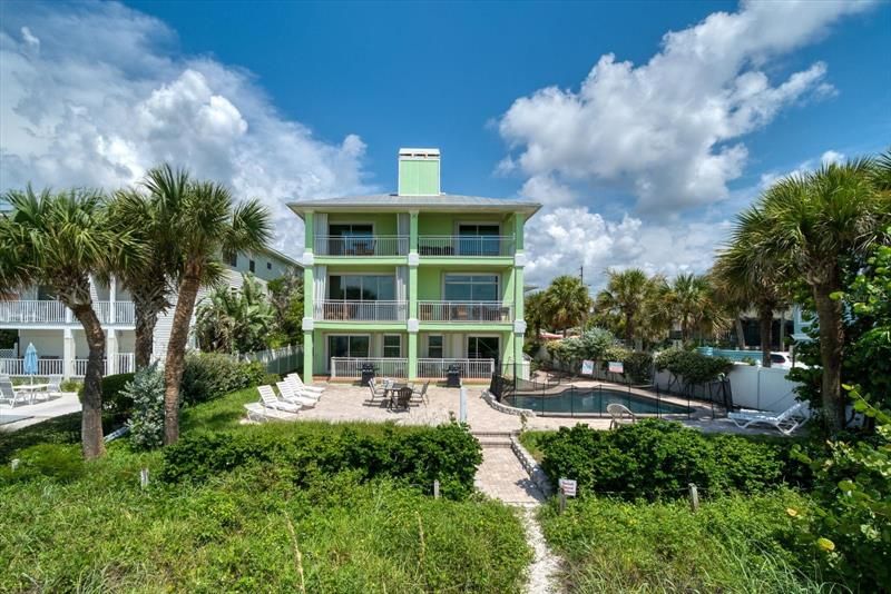 Townhome right on the beach in private building of 2 units.