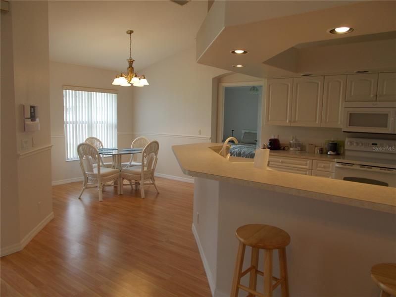 Breakfast nook off kitchen.