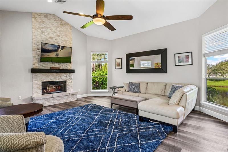 Family room with gorgeous woodburning fireplace