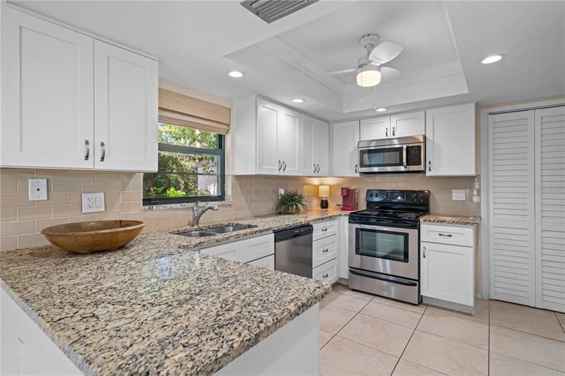 Beautifully updated kitchen with granite counters