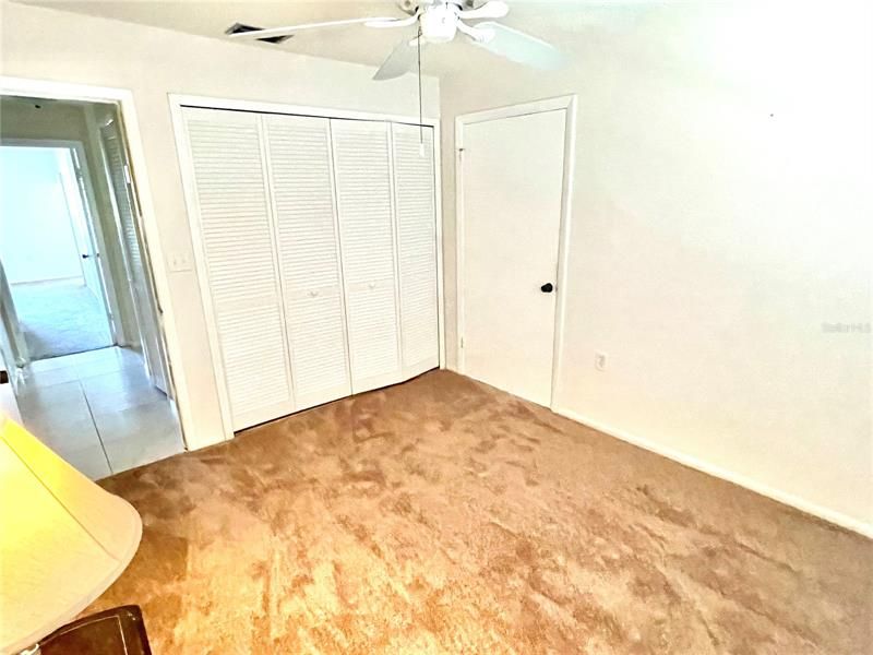This bedroom also has new carpet and wood closet doors