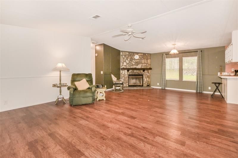 Living/Dining Room Combo with Wood Burning Fireplace