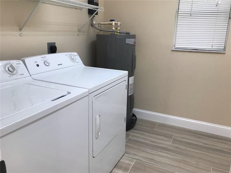Separate laundry Room.