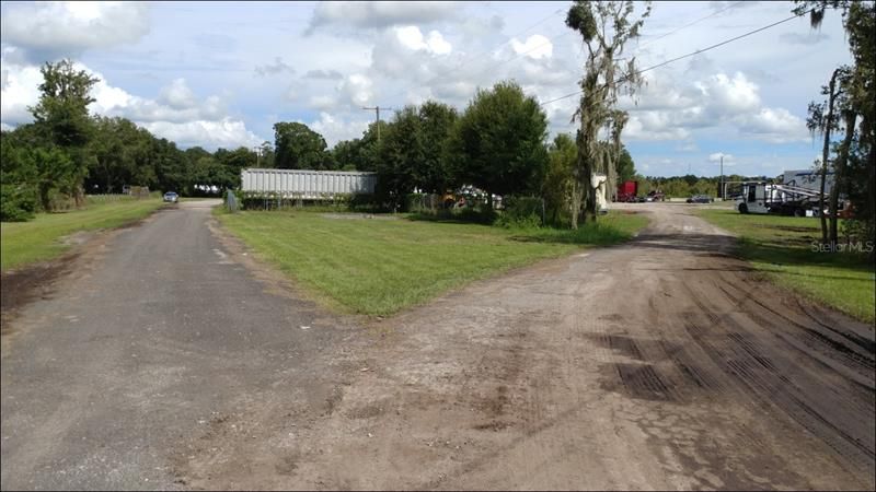 Fork - Left: Cars to paved parking lot - Right: Trucks to parking