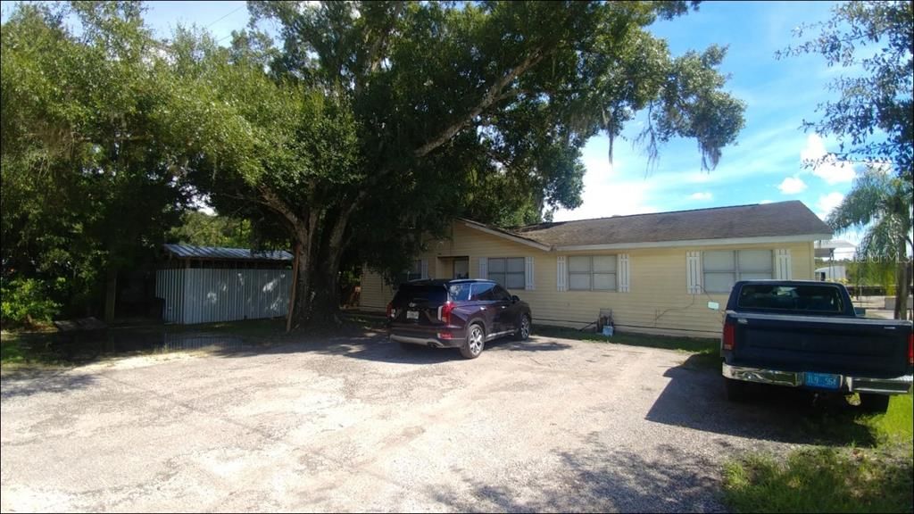 Wood frame house - shingle roof - 5 Bedrooms / 3 Bathrooms - 1,709 sq/ft - storage shed to the left