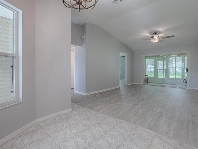 HIGH, VAULTED CEILINGS AND JUST LOOK AT THE FLOORING!