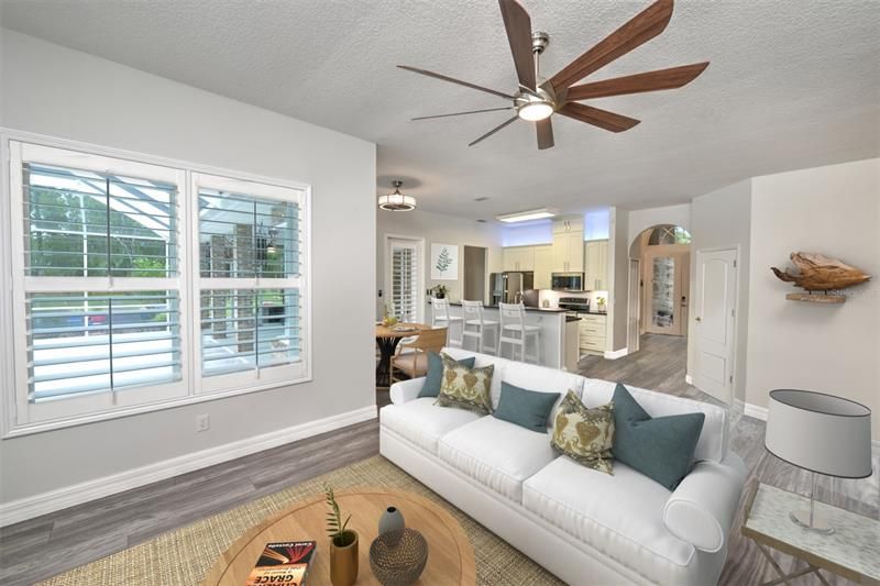 Family room with plantation shutters.