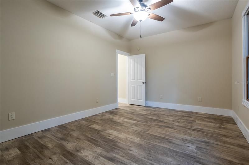 Oversized Spare Bedroom With New Floors