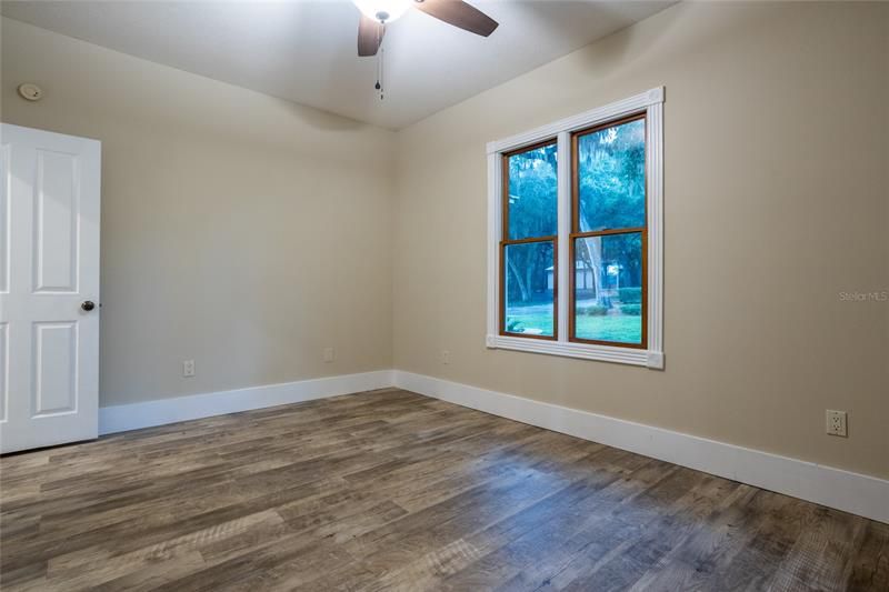 Oversized Spare Bedroom With New Floors