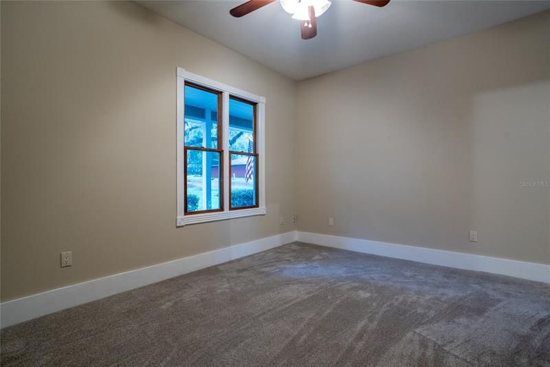 Oversized Spare Bedroom With New Carpet
