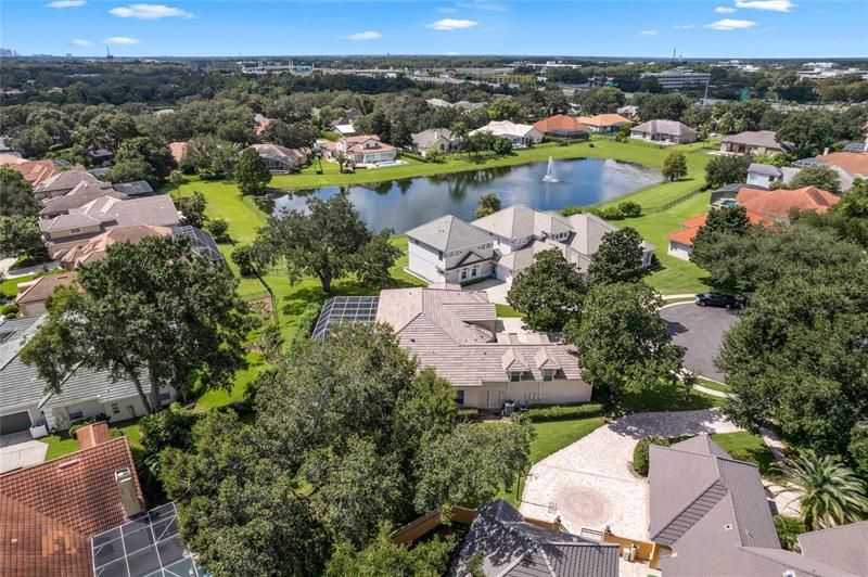 aerial from left side of home with fountain