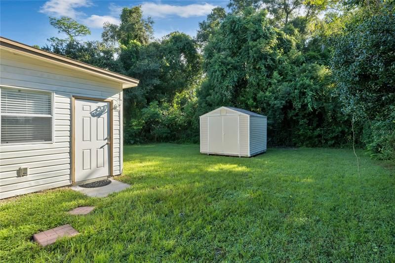 Private backyard with Storage shed