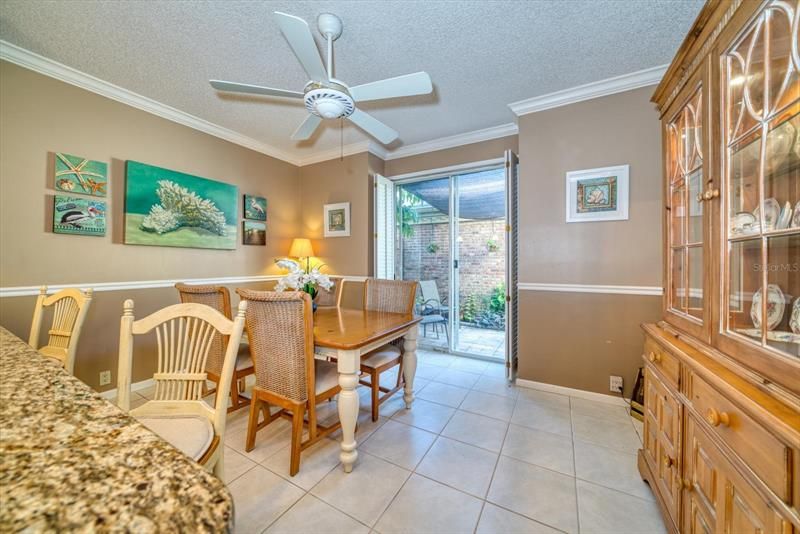Breakfast nook or possible den overlooks the private front patio