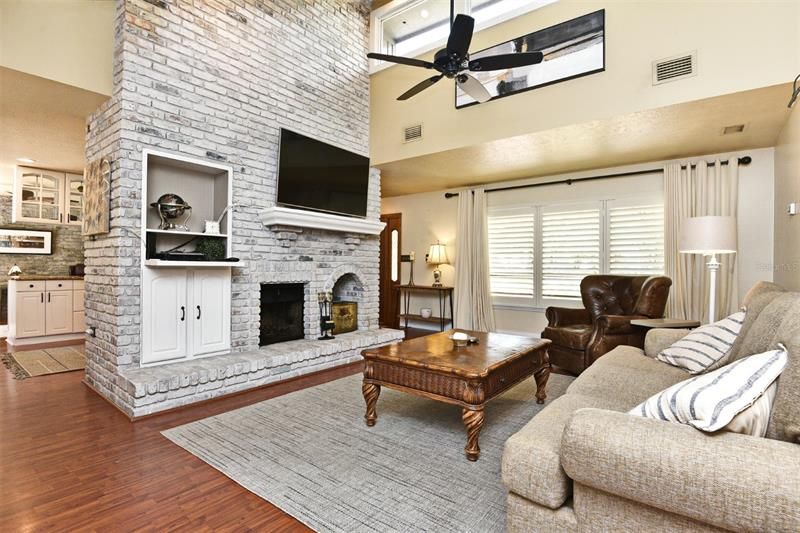 Family Room with Fireplace and Built in Shelves
